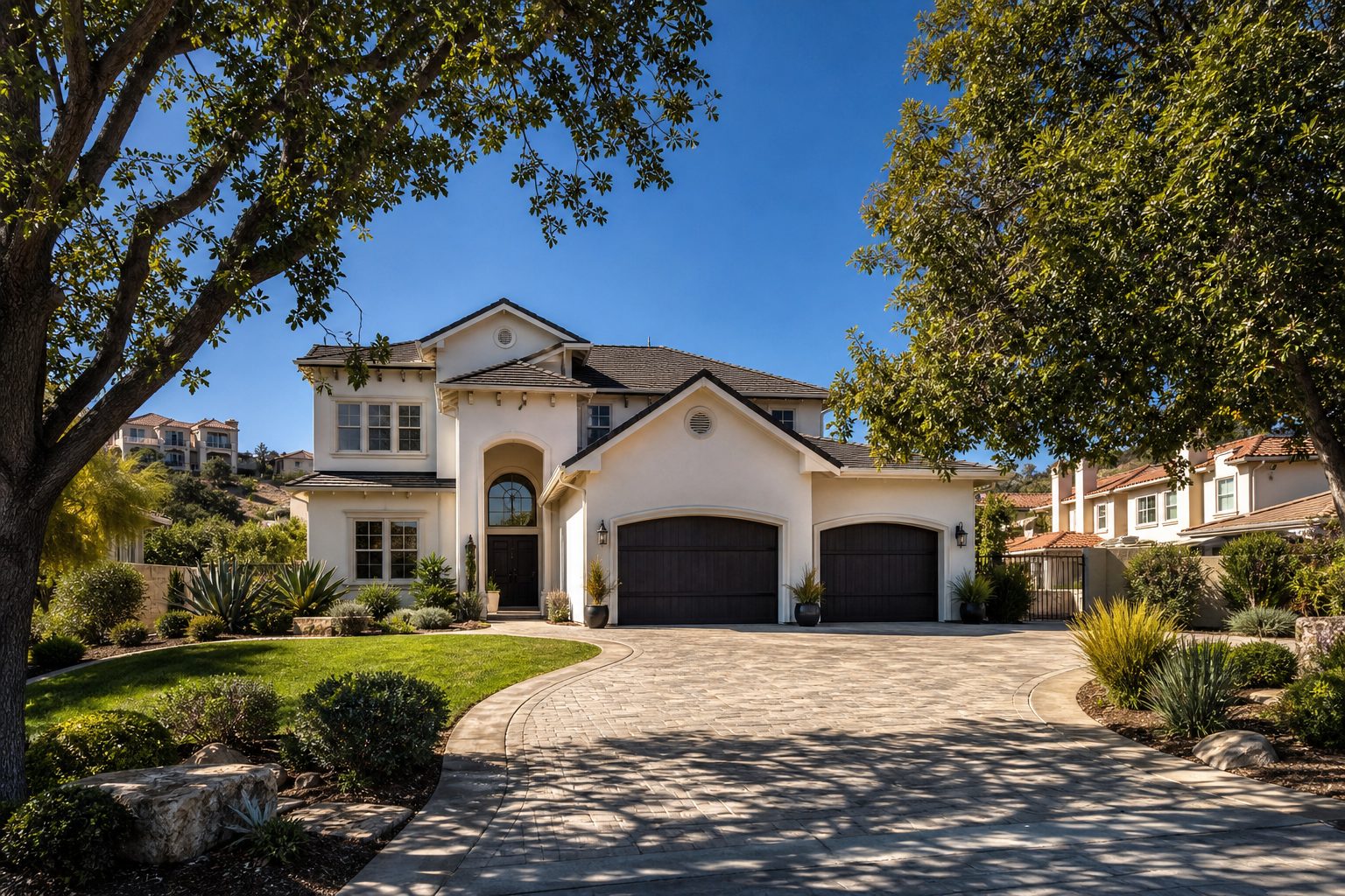 Single-family home with curved driveway and desert landscaping in Scripps Ranch military community, San Diego.